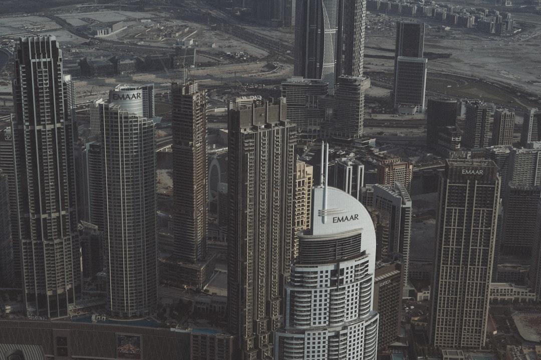 An aerial view of a city with tall buildings