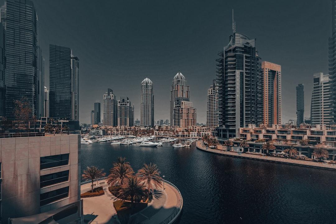 A picture of a city with a river running through it